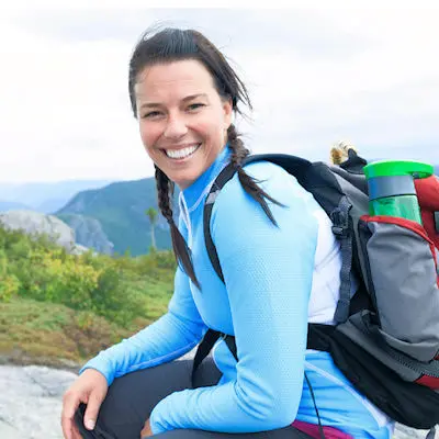 Smiling woman hiking
