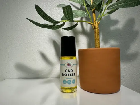 CBD Roller and plant
